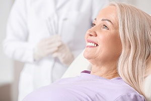 patient smiling after getting restoration 