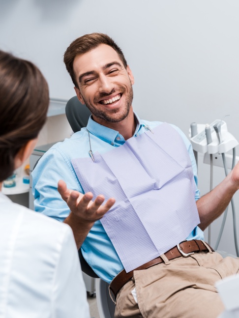 Man smiling in dental treatment chair